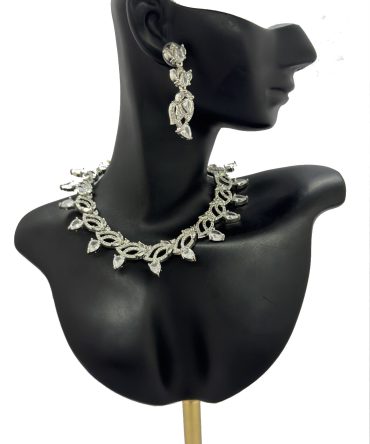 Contemporary American Diamond necklace set in a silver looking finish