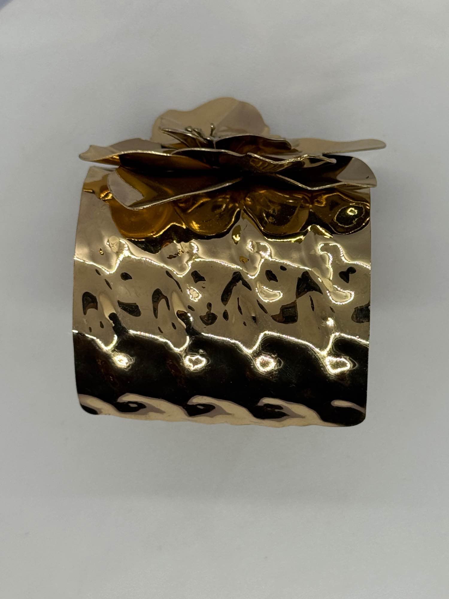 Decorative floral cuff bracelet similar to hammered gold camellia styles