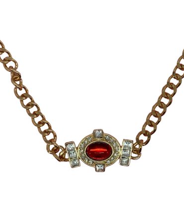 Vintage-style necklace features a central faux ruby cabochon surrounded by clear rhinestones