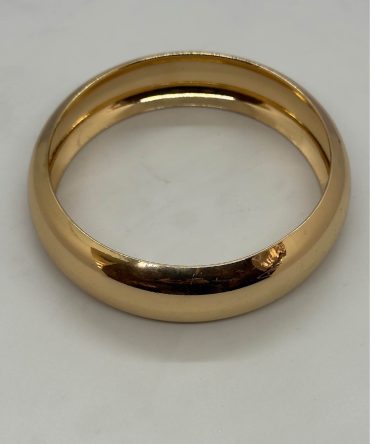 Highly polished gold plated bangle bracelet with a classic