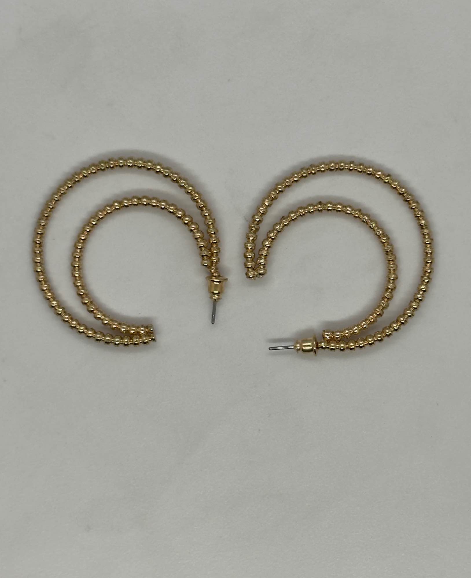 Golden beaded hoop earrings