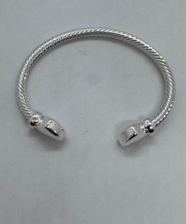 Twisted cable or rope textured bracelet with solid end caps